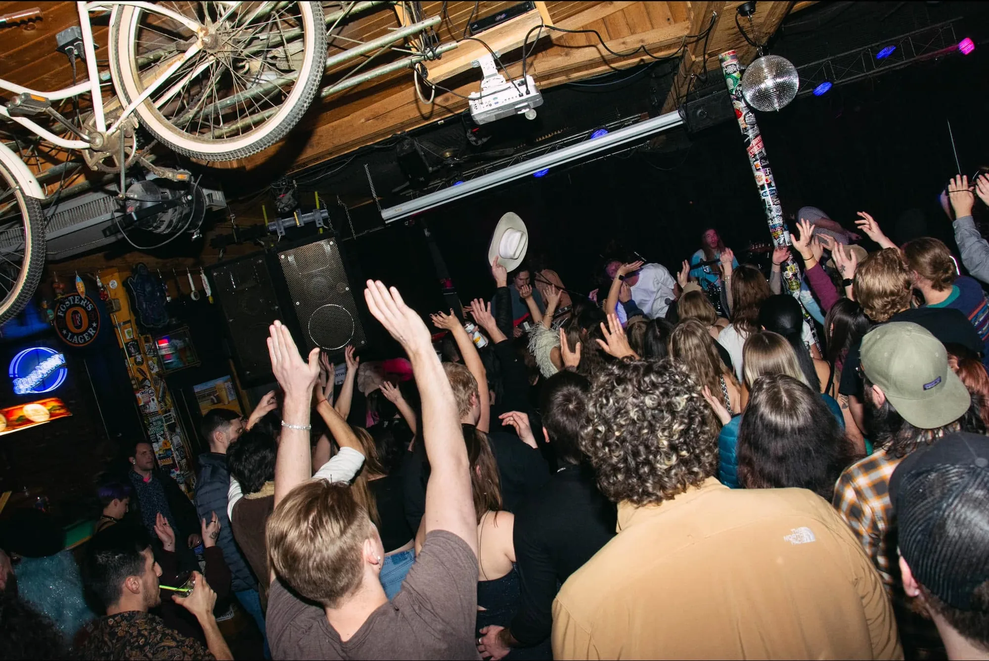 The narrow room at John's Alley, looking down the bar toward the low stage